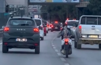 Bursa'da yatarak motosiklet süren maganda kamerada